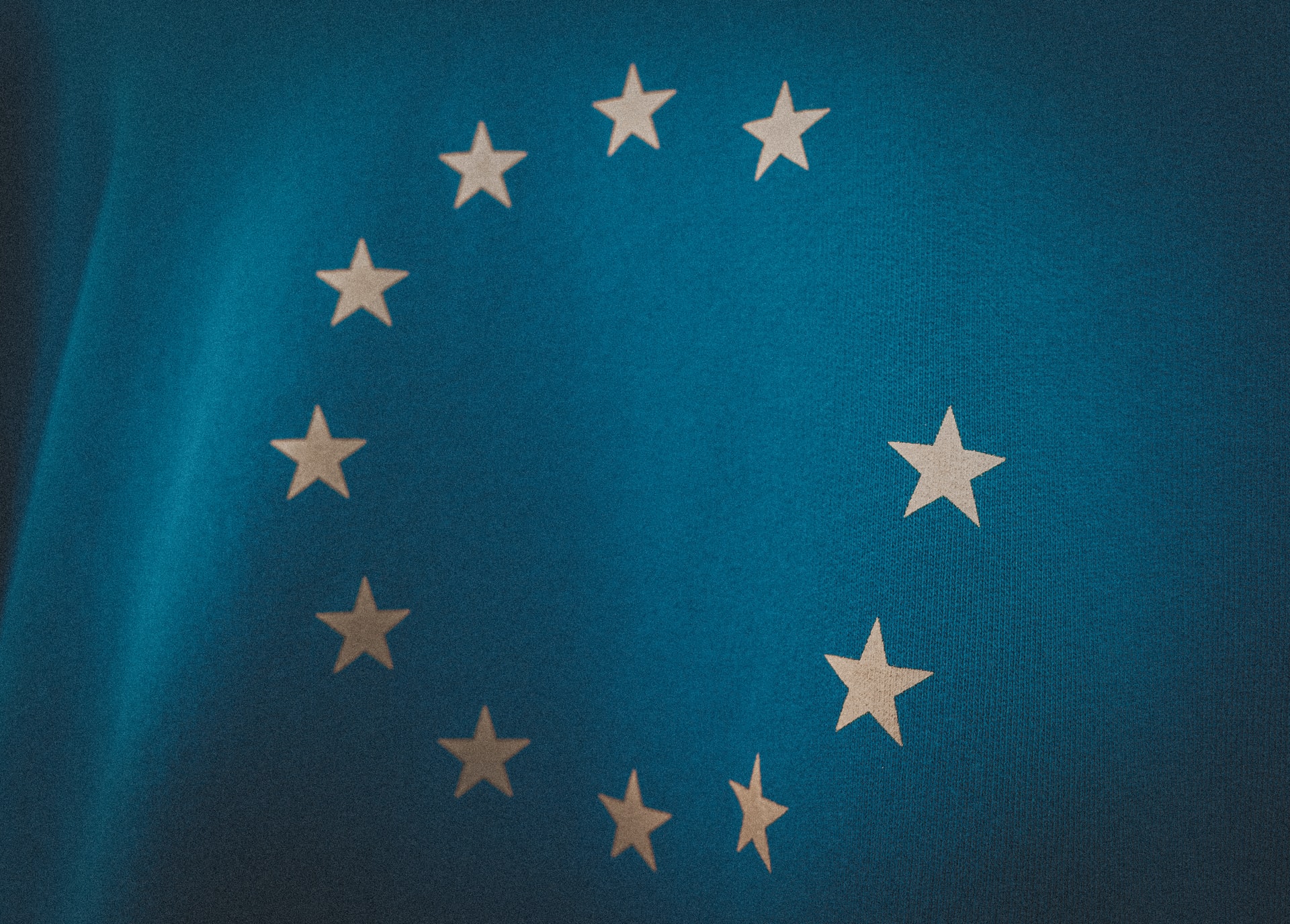 An EU flag with a star missing.